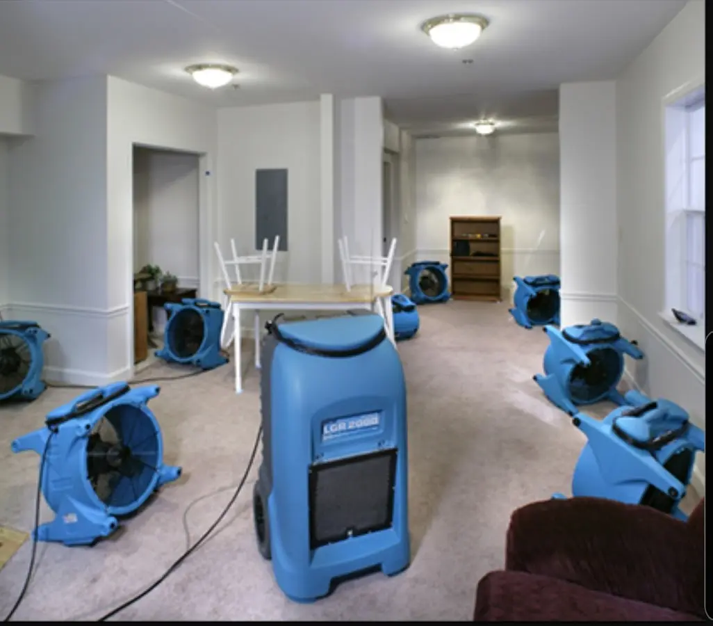 Air movers and dehumidifier setup for Water Damage Restoration in Stanwood